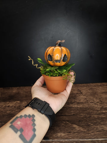 Pumpkin Sculpture In Pot